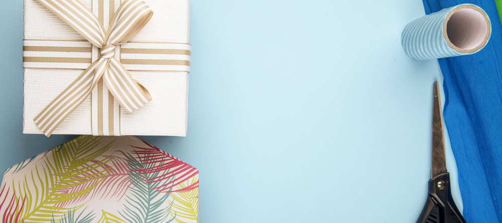 topview giftbox tied with a bow with a blue background