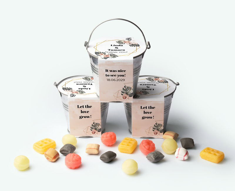 mini bucket of sweets as a wedding thank you with a personalised label