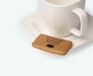 Printed coffee biscuits with text as a thank-you gift presented on a platter