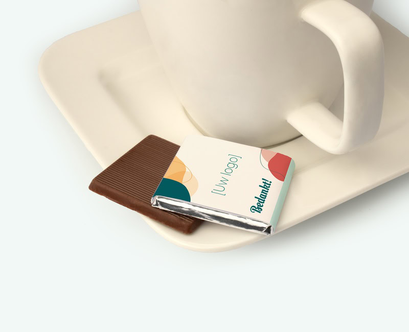 Mini chocolates pictured on a saucer deployed as a business thank-you gift
