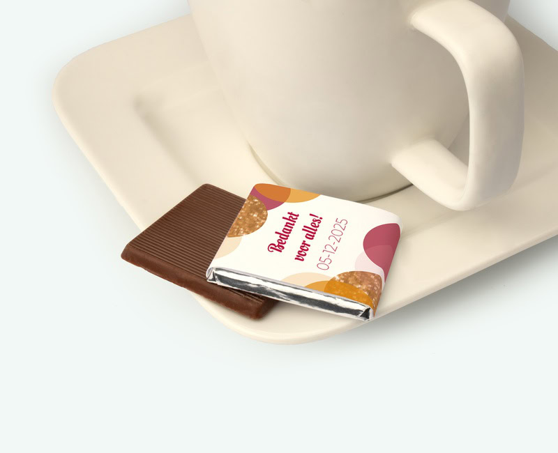 Mini chocolates presented on a saucer as thank-you gifts