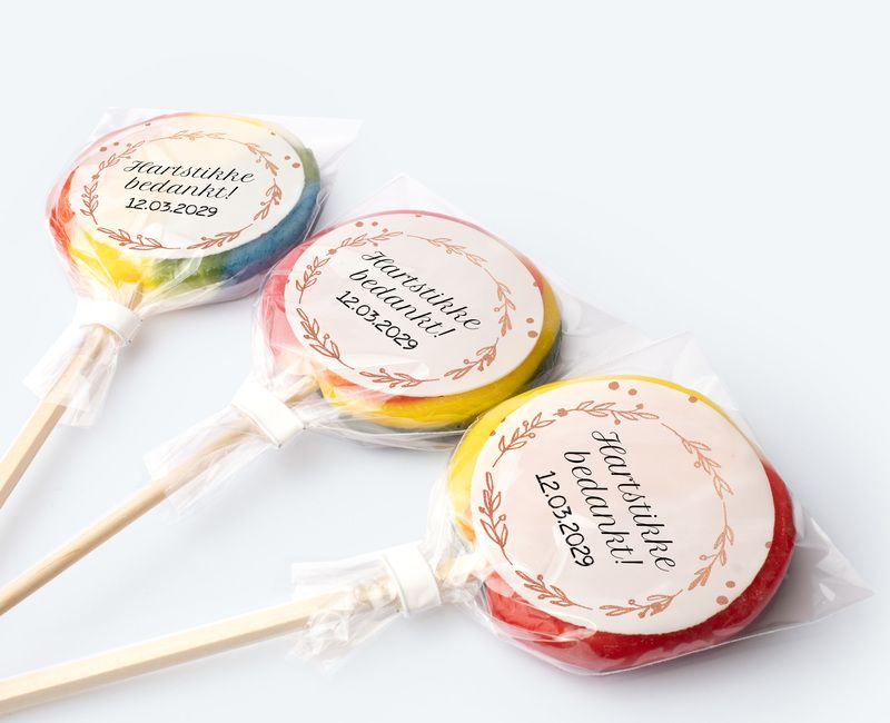 Lollipops with photo and printing used as birthday thank you gifts