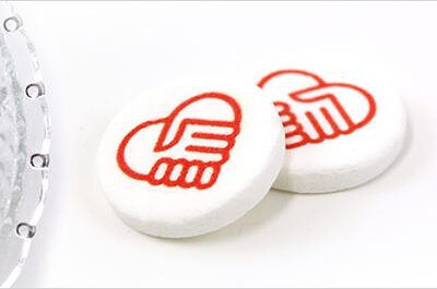 Blog met snoep en logo in de vorm van een pepermunt