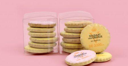 Blog image with a pink background and printed biscuits