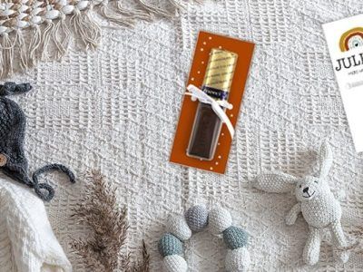Blogafbeelding voor een babyshower met een Merci en regenboog