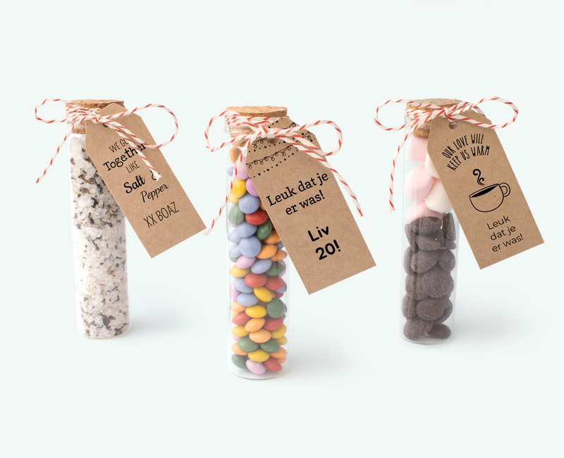 Photo of three Gift Tube thank yous with a personalised card