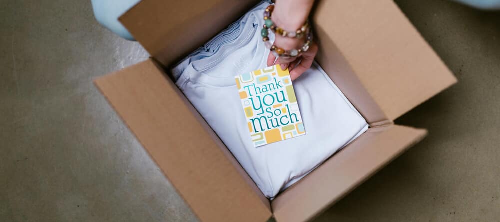 thanking customers with a thank-you card in the box